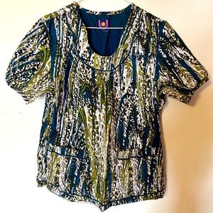 Urbane scrub top fits like a medium